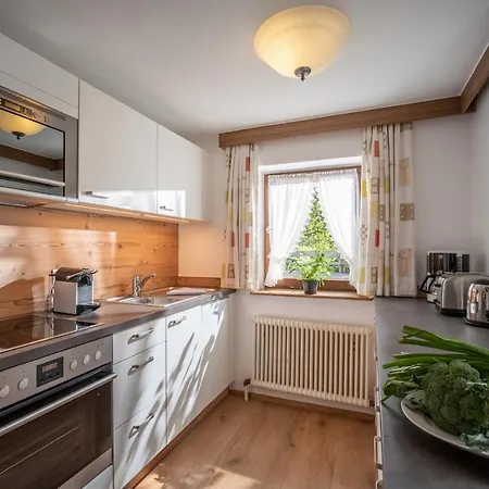 Alpesi faház Ferienhaeuser