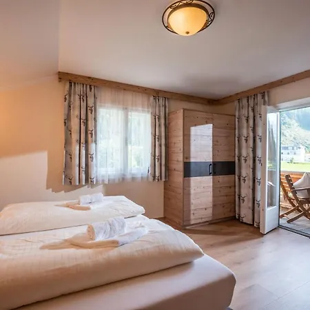 Alpesi faház Ferienhaeuser *