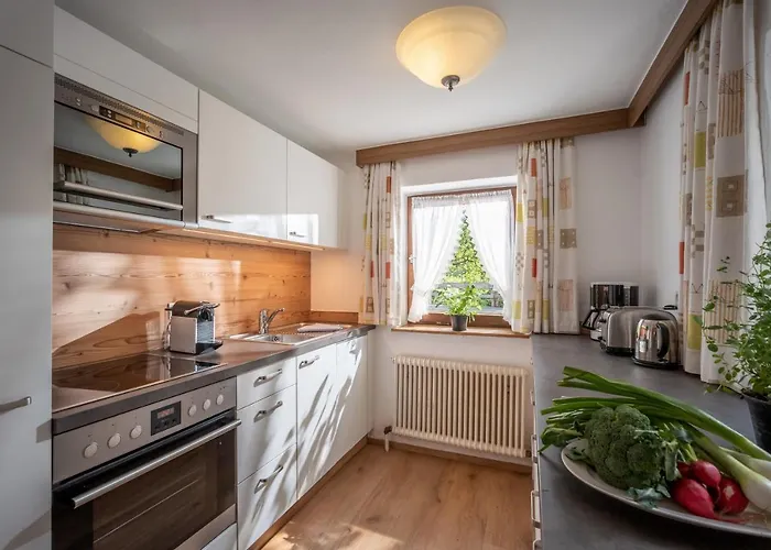 Alpesi faház Ferienhaeuser